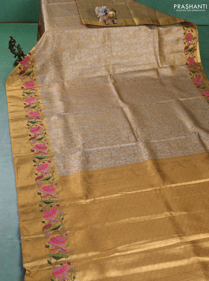 Art tissue silk sare gold with allover brocade weaves and embroidery work border