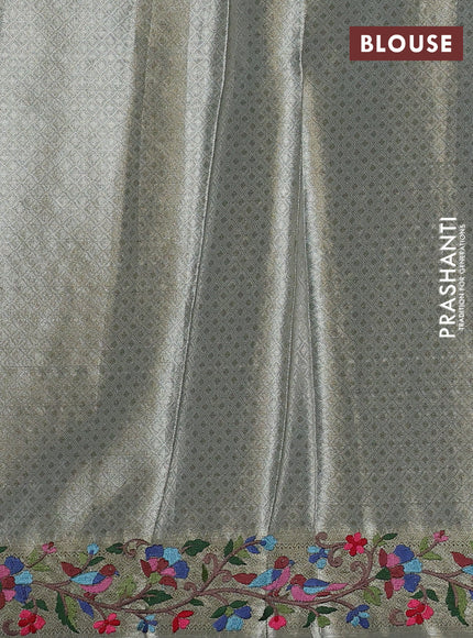 Art tissue silk sare pastel grey with allover brocade weaves and embroidery work border