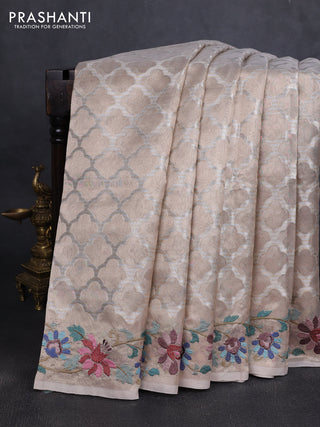 Tissue silk sare beige with allover brocade weaves and embroidery work border