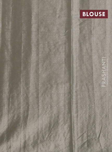 Art tissue silk sare off white and grey black with allover brocade weaves and embroidery work border