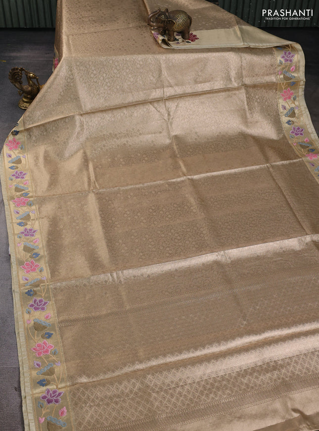 Tissue silk sare sandal and beige with allover brocade weaves and embroidery work border