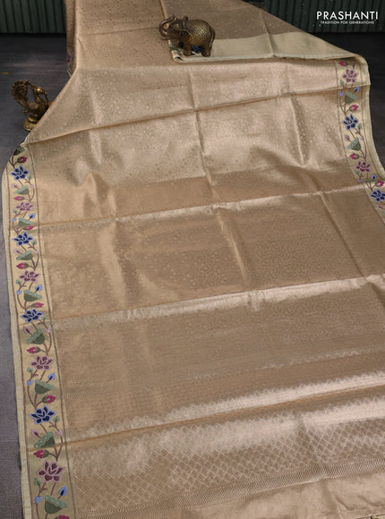 Art tissue silk sare sandal and green brown with allover brocade weaves and embroidery work border