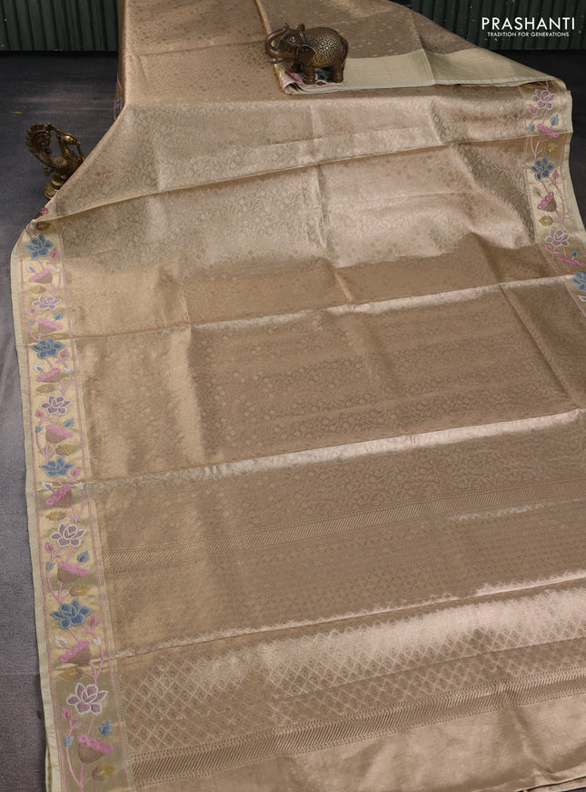 Tissue silk sare sandal shade and brown light pink with allover brocade weaves and embroidery work border