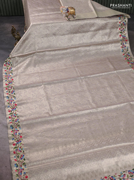 Art tissue silk sare gold beige with allover brocade weaves and embroidery work border
