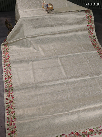 Art tissue silk sare golden beige with allover brocade weaves and embroidery work border
