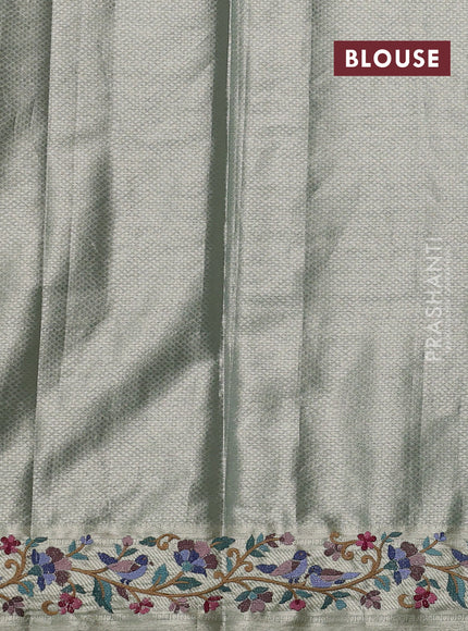 Art tissue silk sare gold pastel green with allover brocade weaves and embroidery work border