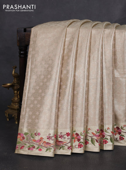 Art tissue silk sare beige and sandal with allover brocade weaves and embroidery work border
