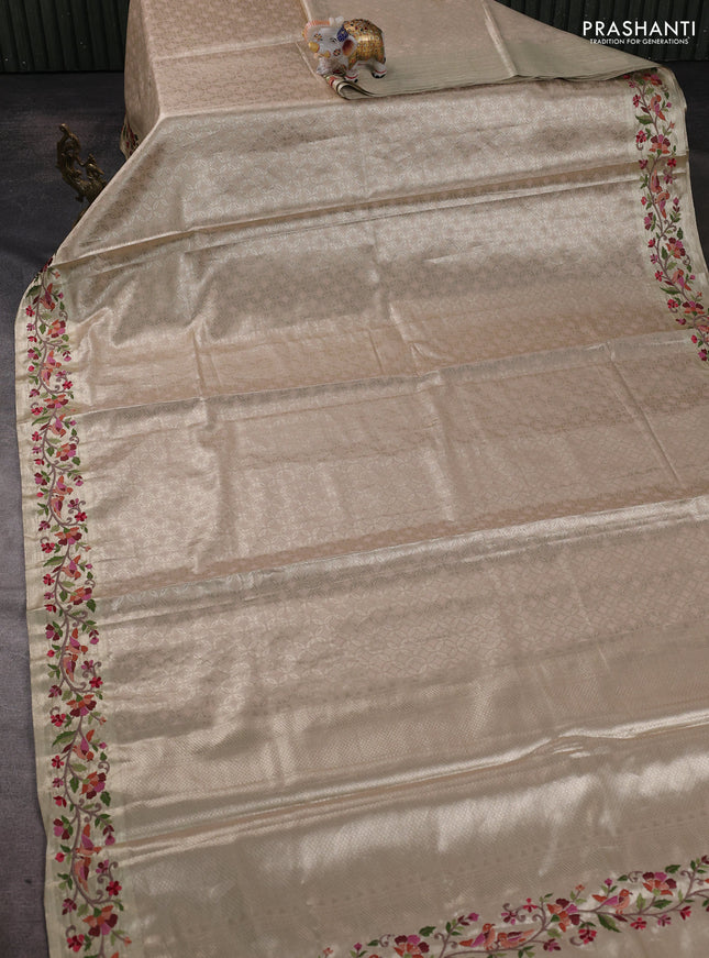 Tissue silk sare beige and sandal with allover brocade weaves and embroidery work border