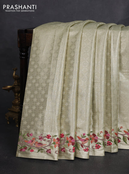 Art tissue silk sare beige with allover brocade weaves and embroidery work border