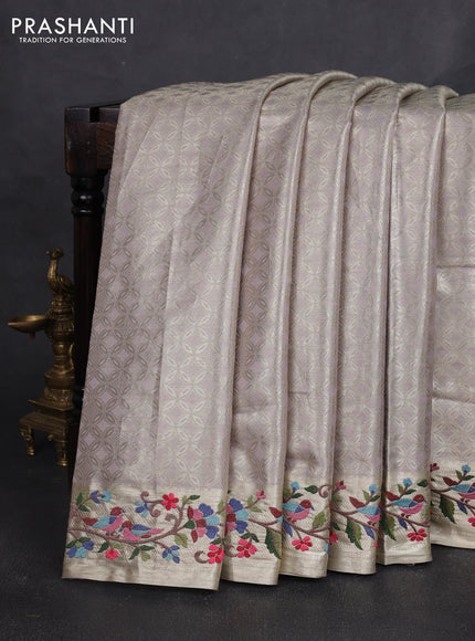 Art tissue silk sare pastel purple with allover brocade weaves and embroidery work border