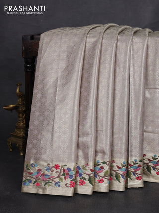 Tissue silk sare pastel purple with allover brocade weaves and embroidery work border