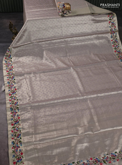 Art tissue silk sare pastel purple with allover brocade weaves and embroidery work border