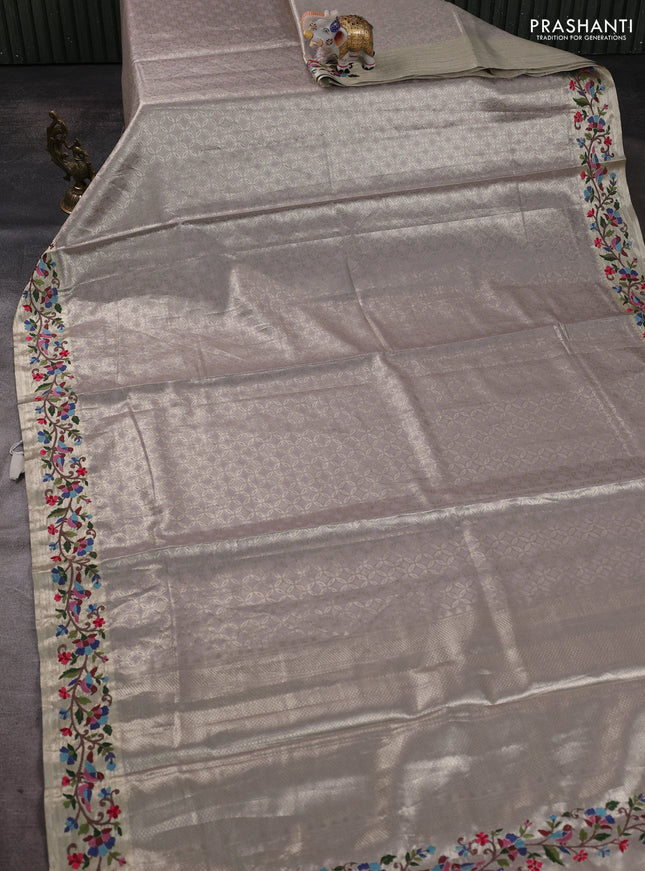 Tissue silk sare pastel purple with allover brocade weaves and embroidery work border