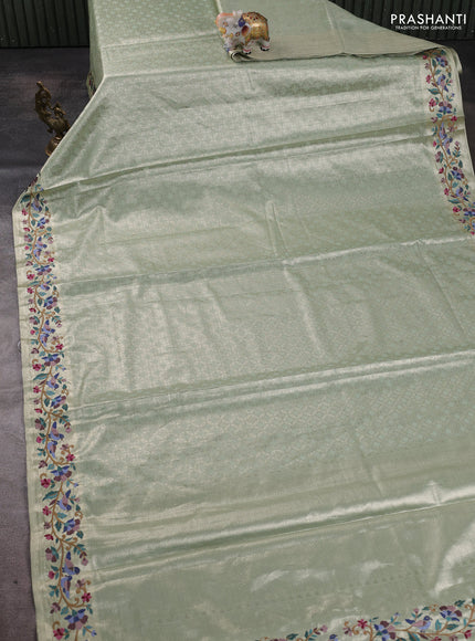 Art tissue silk sare pista green with allover brocade weaves and embroidery work border