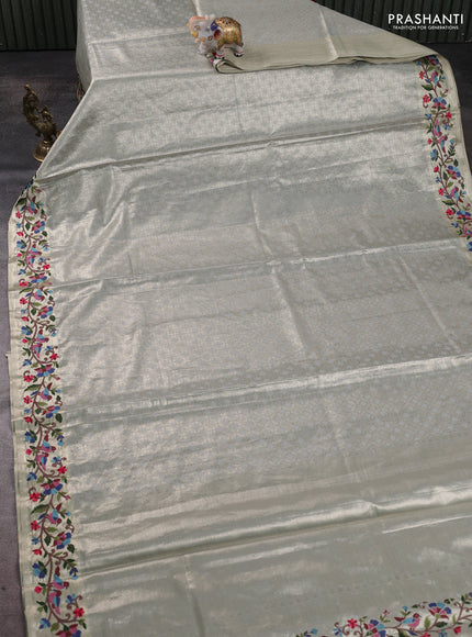 Art tissue silk sare pastel grey with allover brocade weaves and embroidery work border