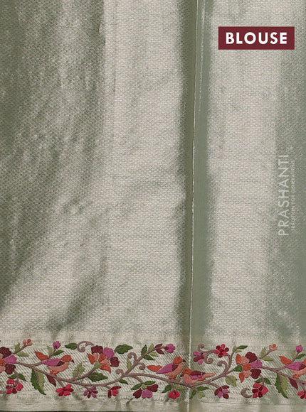 Art tissue silk sare pastel green with allover brocade weaves and embroidery work border