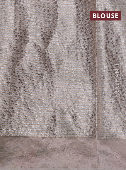 Art tissue silk sare pastel pink shade with allover brocade weaves and embroidery work border