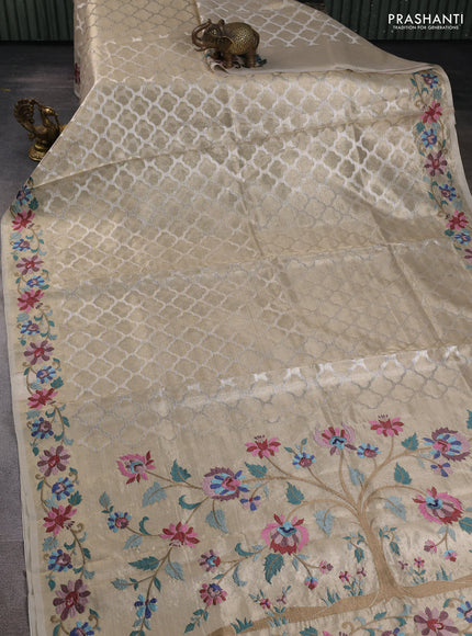 Art tissue silk sare pastel grey with allover brocade weaves and embroidery work border
