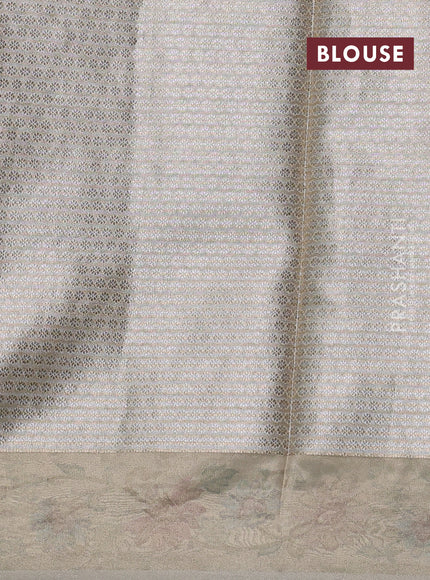 Art tissue silk sare pastel grey with allover brocade weaves and embroidery work border