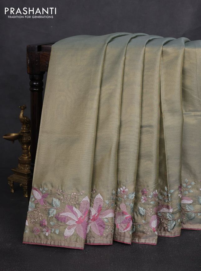 Tissue silk sare pastel green and rosy brown with plain body and embroidery work border