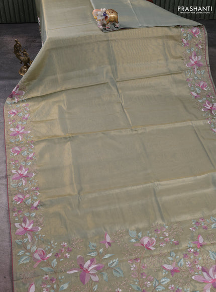 Art tissue silk sare pastel green and rosy brown with plain body and embroidery work border