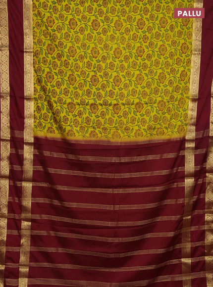 Semi mysore silk saree green and maroon with allover floral prints and long rettapet zari woven border