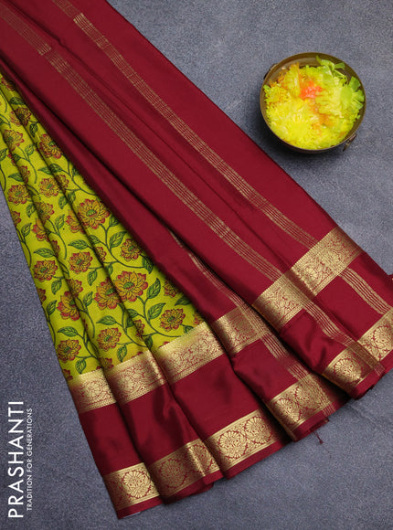 Semi mysore silk saree lime green and maroon with allover floral prints and long rettapet zari woven border