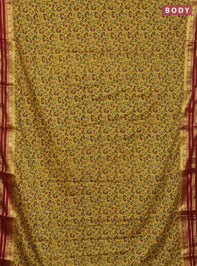 Semi mysore silk saree yellow and maroon with allover floral prints and zari woven border
