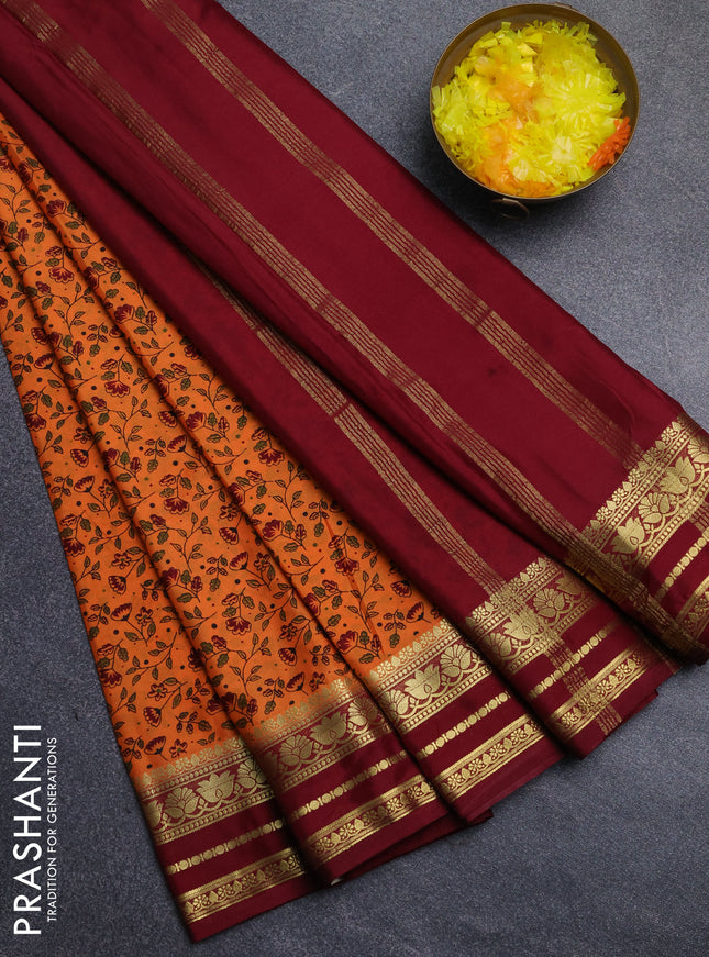 Semi mysore silk saree orange and maroon with allover floral prints and zari woven border