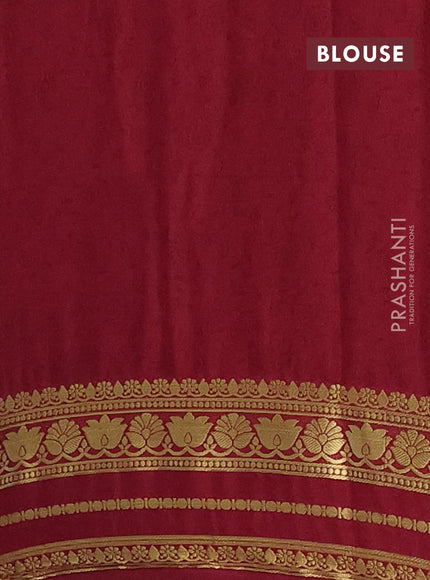 Semi mysore silk saree orange and maroon with allover floral prints and zari woven border