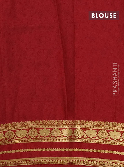 Semi mysore silk saree orange and maroon with allover floral prints and zari woven border