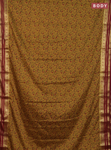 Semi mysore silk saree sandal and maroon with allover floral prints and zari woven border