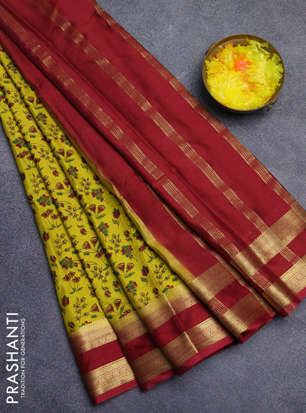 Semi mysore silk saree yellow and maroon with allover floral prints and rettapet zari woven border