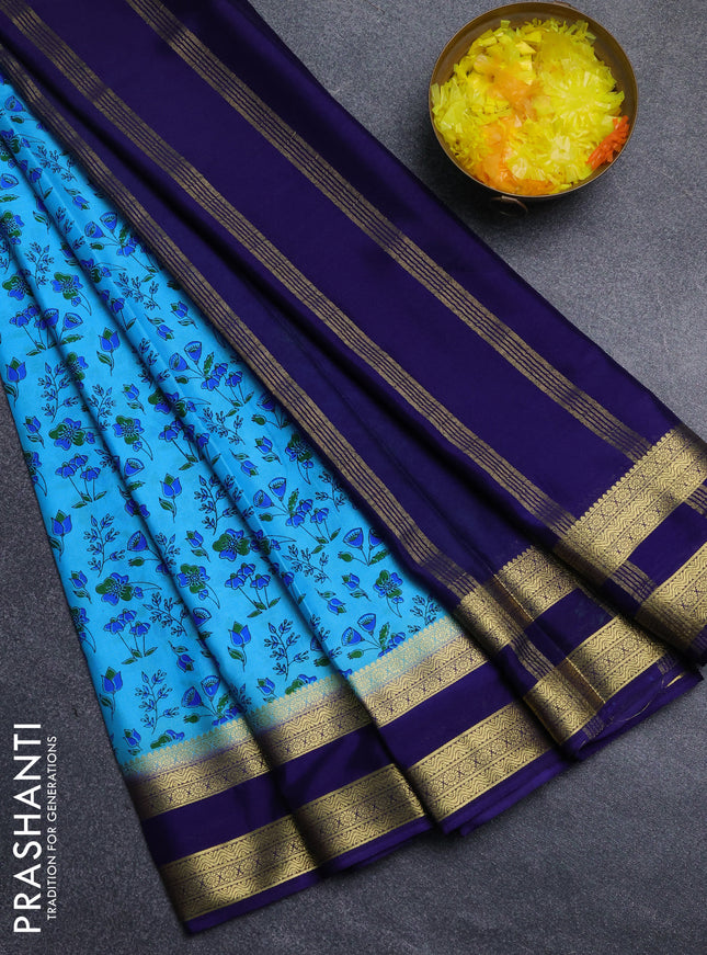 Semi mysore silk saree teal blue and navy blue with allover floral prints and rettapet zari woven border