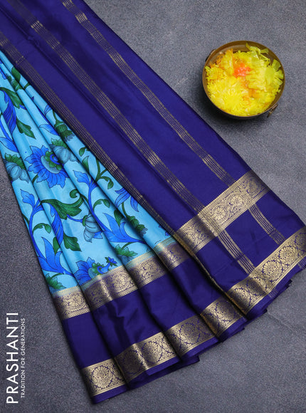 Semi mysore silk saree light blue and navy blue with allover floral prints and long rettapet zari woven border