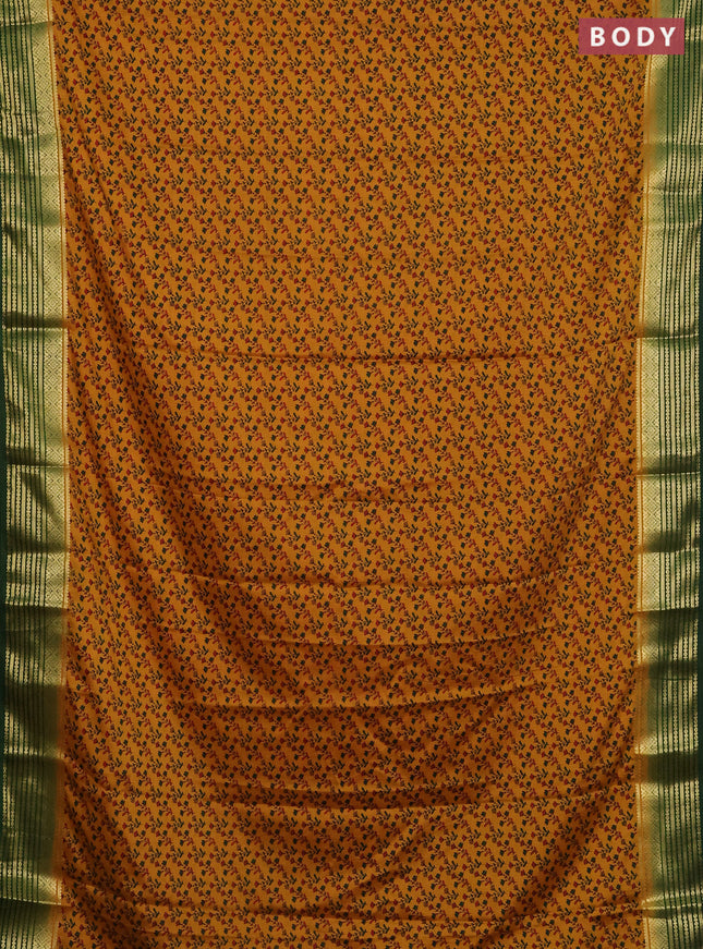 Semi mysore silk saree mustard yellow and green with allover floral prints and zari woven border