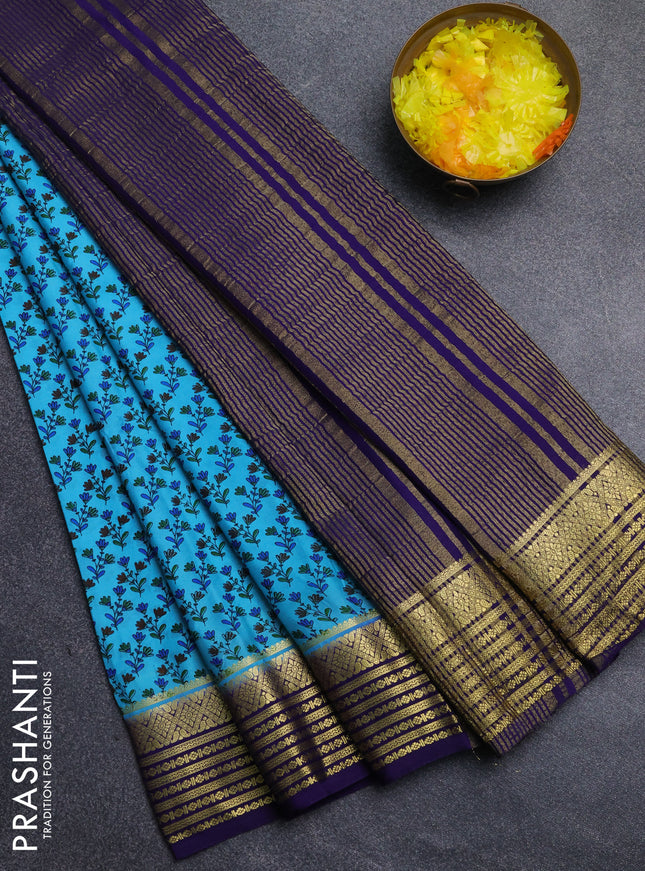 Semi mysore silk saree teal blue and violet with allover floral prints and zari woven border