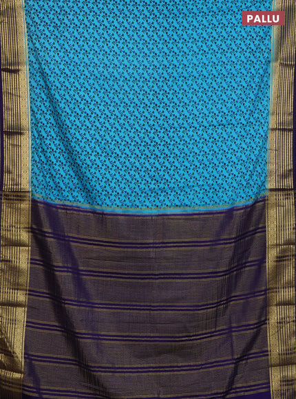 Semi mysore silk saree teal blue and violet with allover floral prints and zari woven border