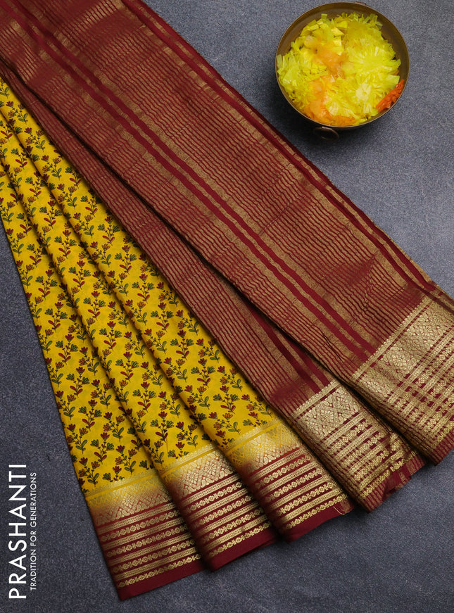 Semi mysore silk saree yellow and maroon with allover floral prints and zari woven border