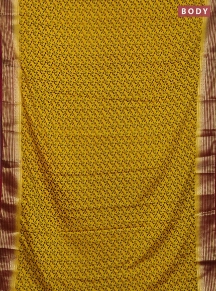 Semi mysore silk saree yellow and maroon with allover floral prints and zari woven border