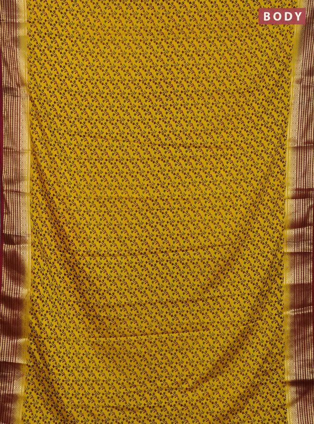 Semi mysore silk saree yellow and maroon with allover floral prints and zari woven border