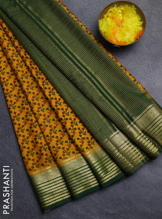Semi mysore silk saree dark mustard and green with allover floral prints and zari woven border