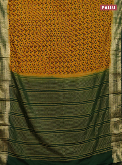 Semi mysore silk saree dark mustard and green with allover floral prints and zari woven border