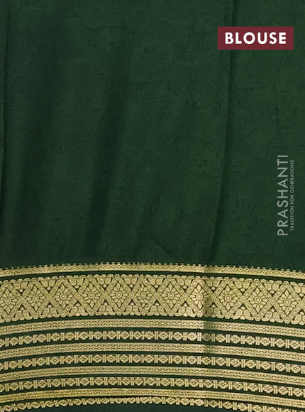 Semi mysore silk saree dark mustard and green with allover floral prints and zari woven border