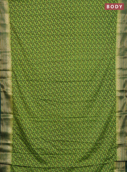 Semi mysore silk saree light green and green with allover floral prints and zari woven border