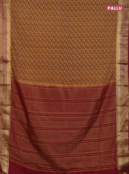 Semi mysore silk saree dark sandal and maroon with allover floral prints and zari woven border