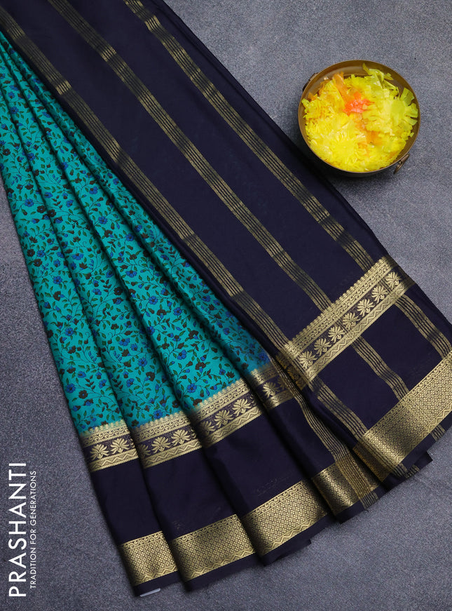 Semi mysore silk saree teal green and navy blue with allover floral prints and long rettapet zari woven border