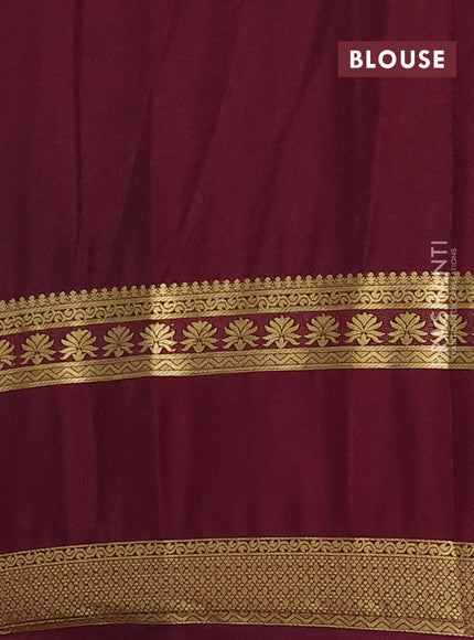 Semi mysore silk saree pastel peach and wine shade with allover floral prints and long rettapet zari woven border