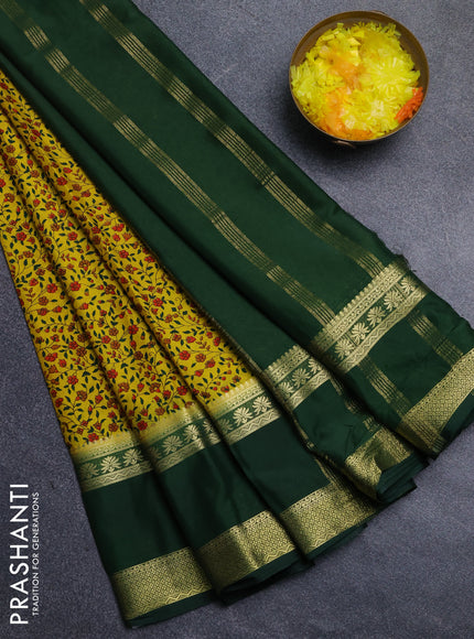 Semi mysore silk saree yellow and bottle green with allover floral prints and long rettapet zari woven border