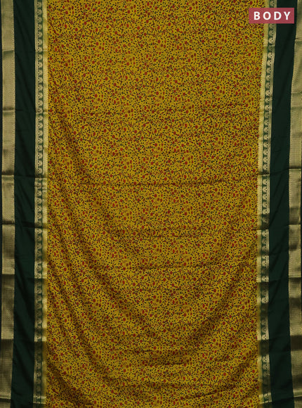 Semi mysore silk saree yellow and bottle green with allover floral prints and long rettapet zari woven border
